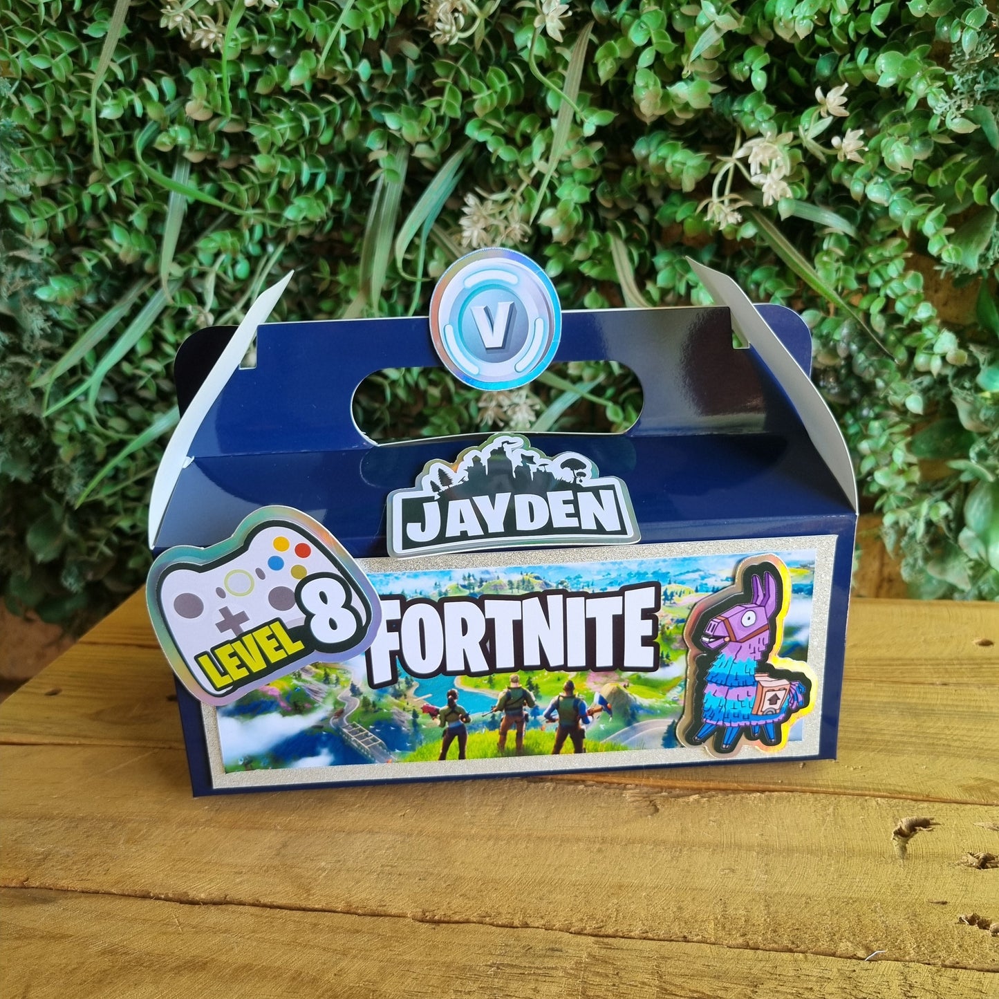 Blue tool with 'Fortnite' branding on a wooden surface and grass background