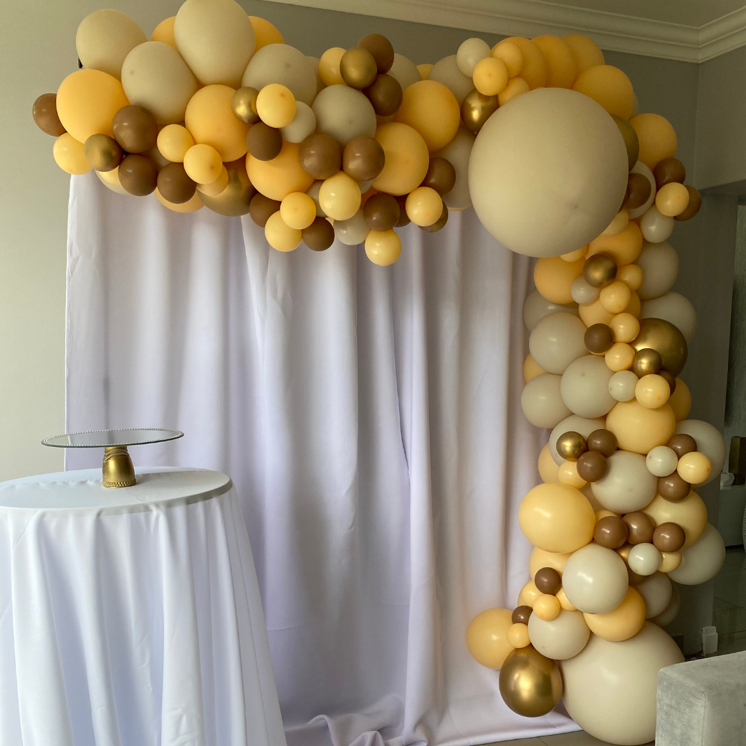 Rectangular Backdrop with Balloon Garland and Cocktail Table