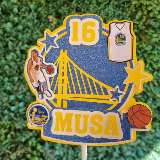 Decorative pick with sports-themed design on a grass background