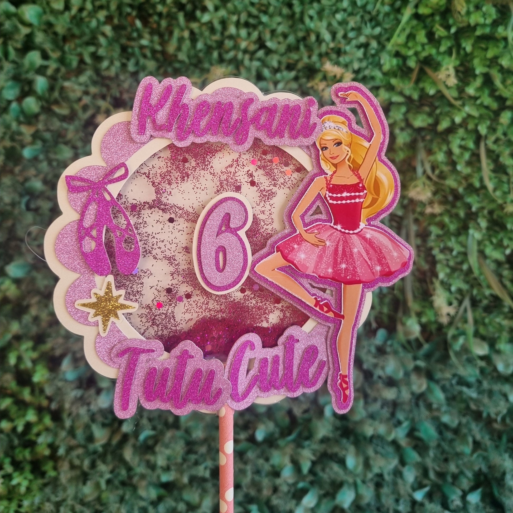 Decorative sticker with a character and text on a grass background