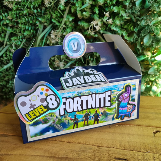 Jayden Fortnite toy packaging on a wooden surface with greenery in the background
