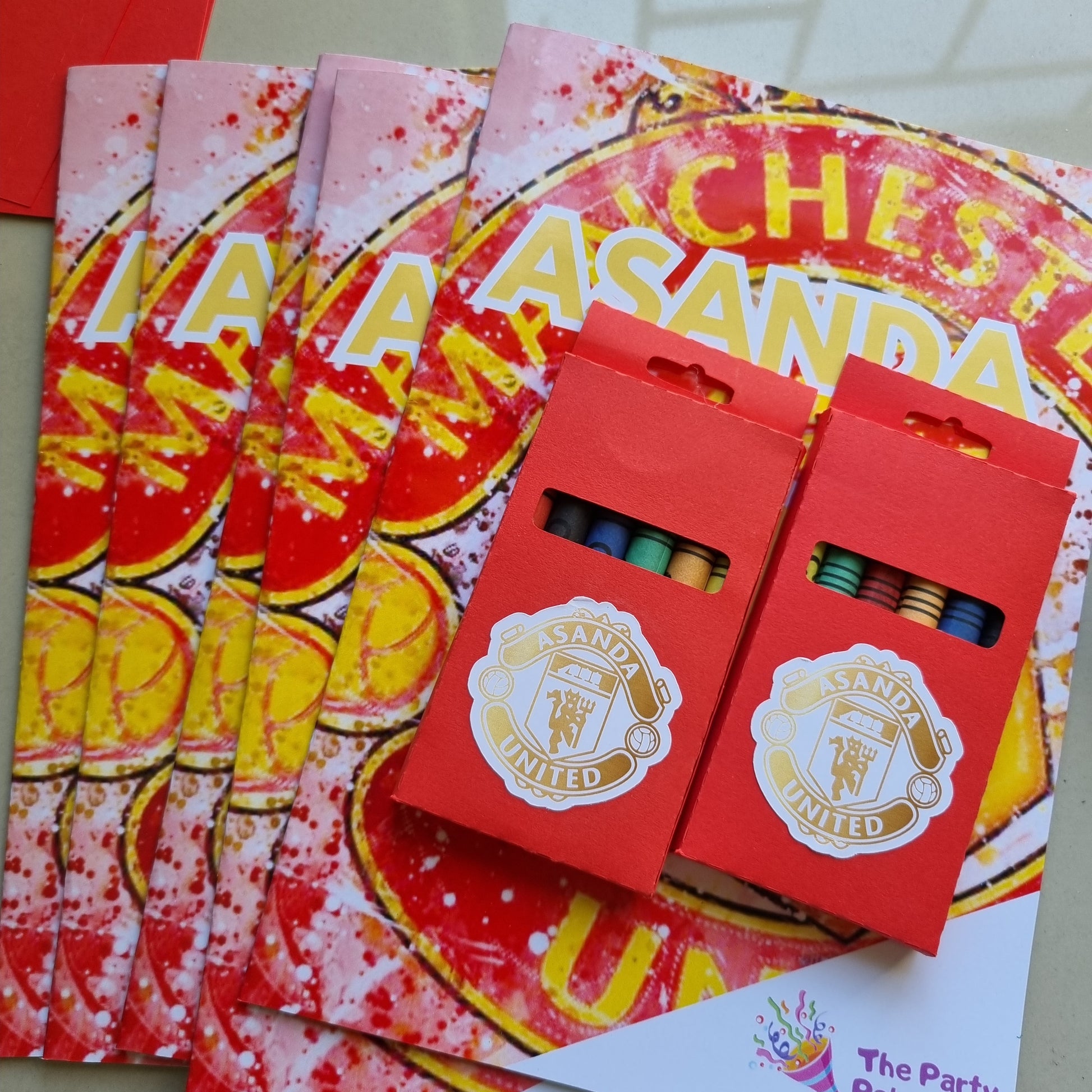 Red envelopes with gold designs on a colorful background