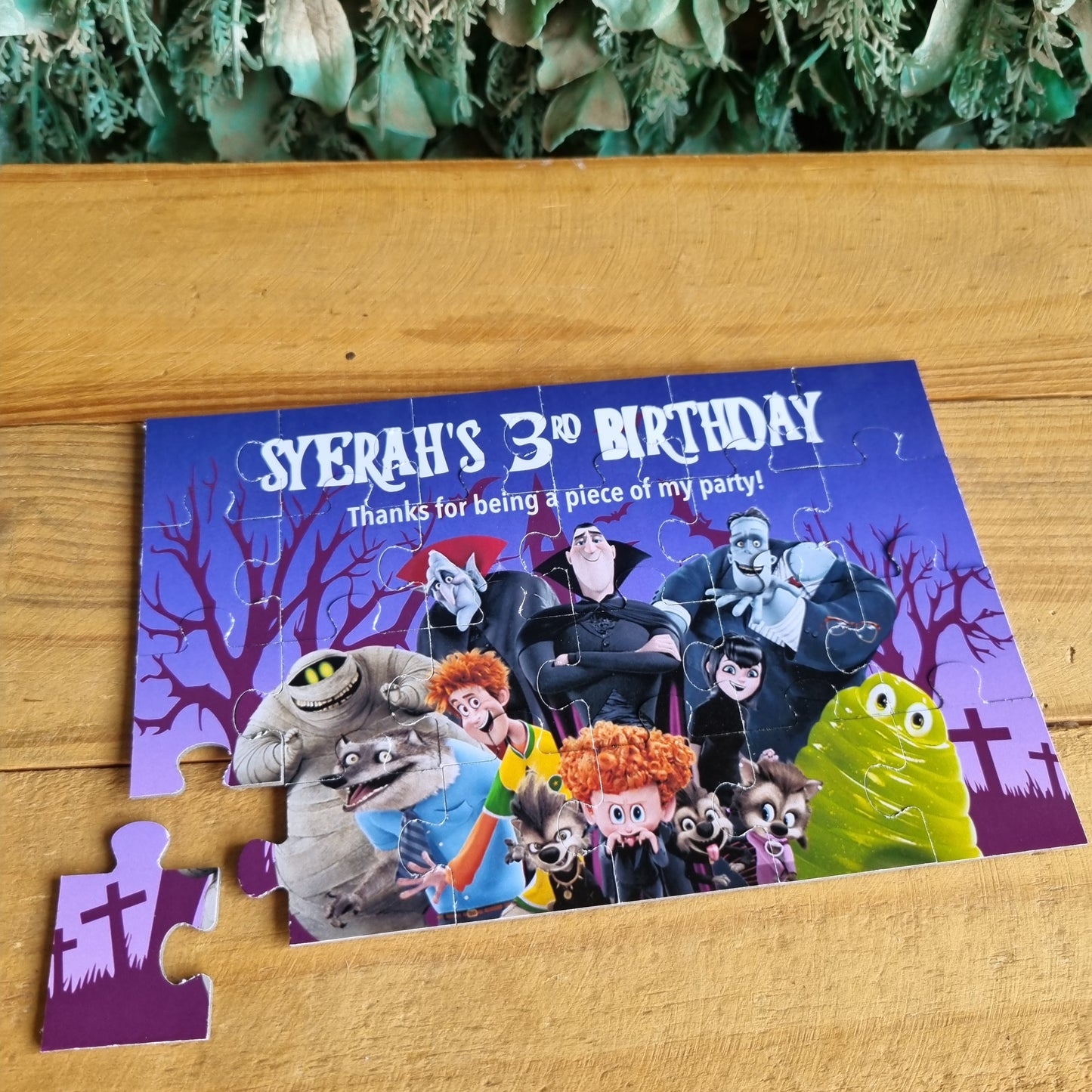 Jigsaw puzzle with characters from 'Sesame Street' on a wooden surface