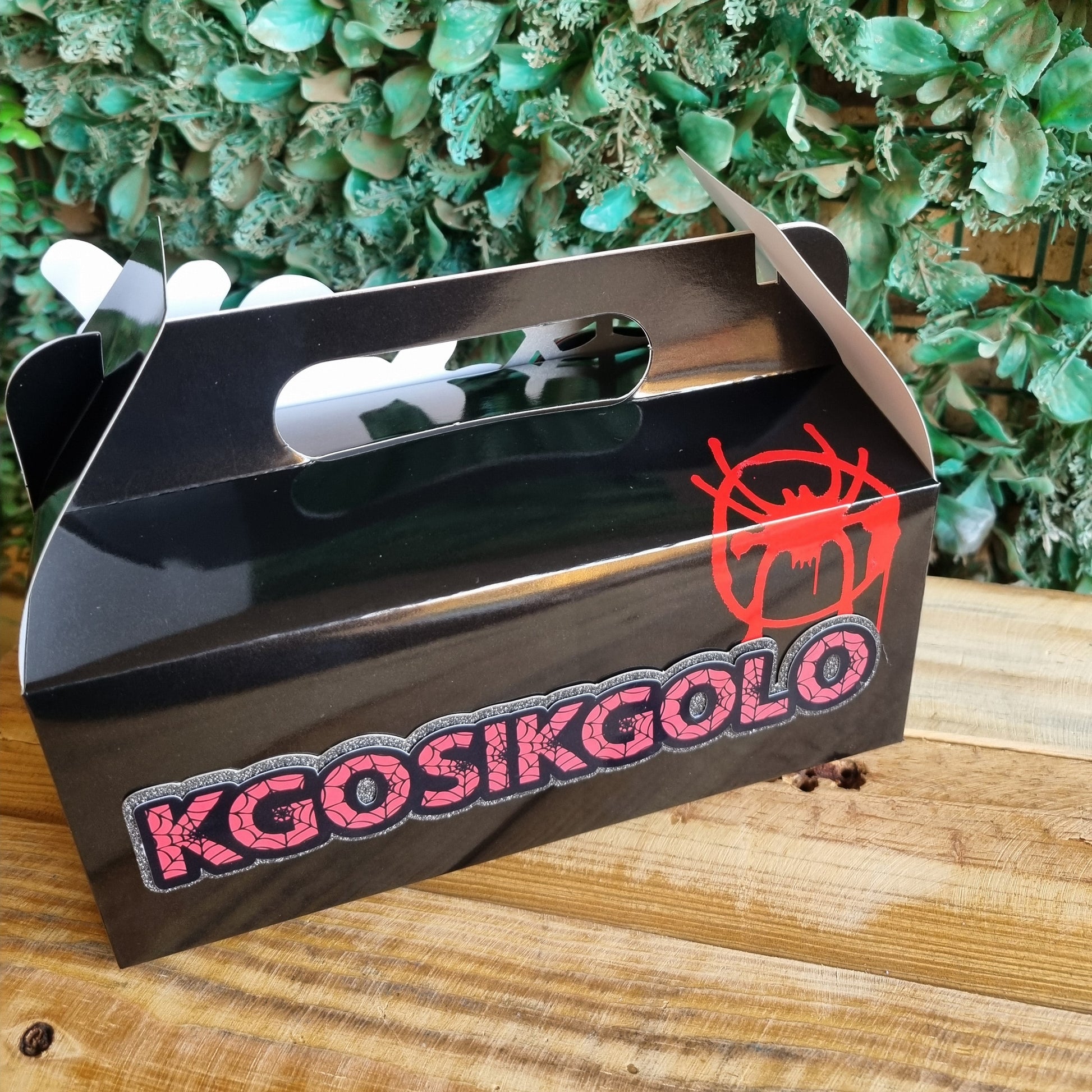 KGO SKGLO branded product on a wooden surface with greenery in the background