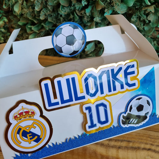 Product packaging with soccer-themed design on a textured surface