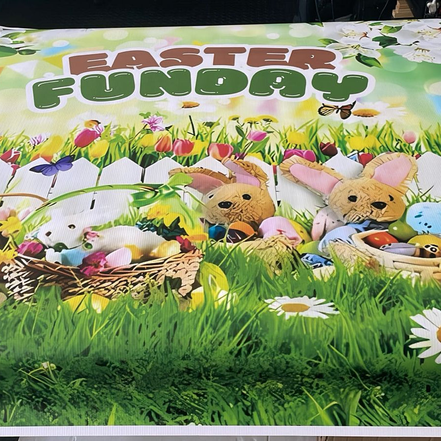 Easter-themed mat with teddy bears, eggs, and flowers on a grassy background.