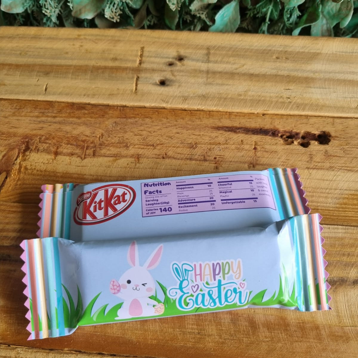 KitKat Easter chocolate bar with bunny design on a wooden surface
